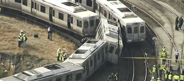 n this image from video provided by WPVI, officials investigate an accident involving out-of-service commuter trains in Upper Darby, Pa., Tuesday, Feb. 21, 2017. n this image from video provided by WPVI, officials investigate an accident involving out-of-service commuter trains in Upper Darby, Pa., Tuesday, Feb. 21, 2017. - Sputnik International