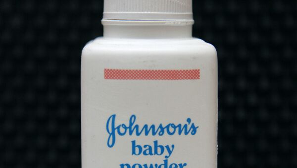 In this April 15, 2011, file photo, a bottle of Johnson's baby powder is displayed. On Monday, Aug. 21, 2017, a Los Angeles County Superior Court spokeswoman confirmed that a jury has ordered Johnson & Johnson to pay $417 million in a case to a woman who claimed in a lawsuit that the talc in the company's iconic baby powder causes ovarian cancer when applied regularly for feminine hygiene. - Sputnik International