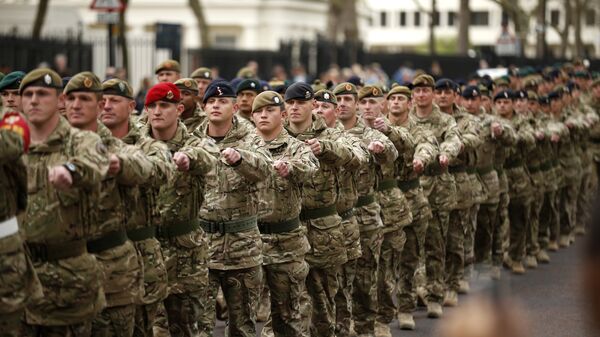 Members of the British military's 4th Mechanised Brigade parade through central London to attend a reception at the Houses of Parliament, Monday, April 22, 2013. The soldiers recently returned from six months serving in Afghanistan's Helmand province. - Sputnik International