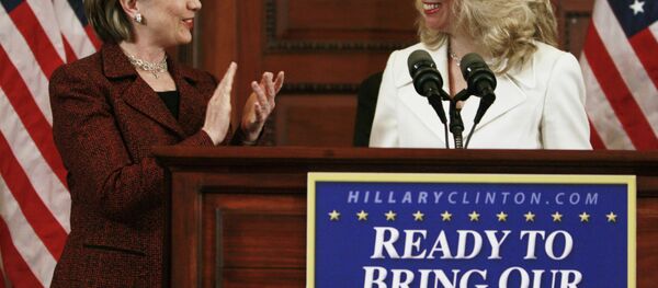 Democratic presidential hopeful, Sen. Hillary Rodham Clinton, D-N.Y., left, applauds former CIA officer Valerie Plame, right, as she speaks, prior to Clinton speaking about Iraq, Tuesday, March 18, 2008, in Philadelphia. - Sputnik International