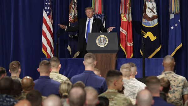 U.S. President Donald Trump gestures as he departs after announcing his strategy for the war in Afghanistan during an address to the nation from Fort Myer, Virginia, U.S., August 21, 2017 - Sputnik International