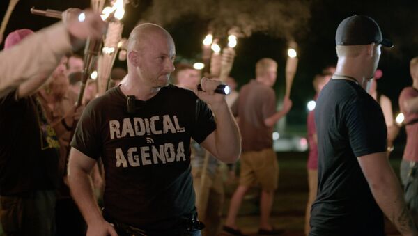 Aug. 11, 2017, image made from a video provided by Vice News Tonight, Christopher Cantwell attends a white nationalist rally in Charlottesville, Va - Sputnik International