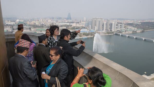 Tourists on the observation deck of the Juche Tower in Pyongyang - Sputnik International