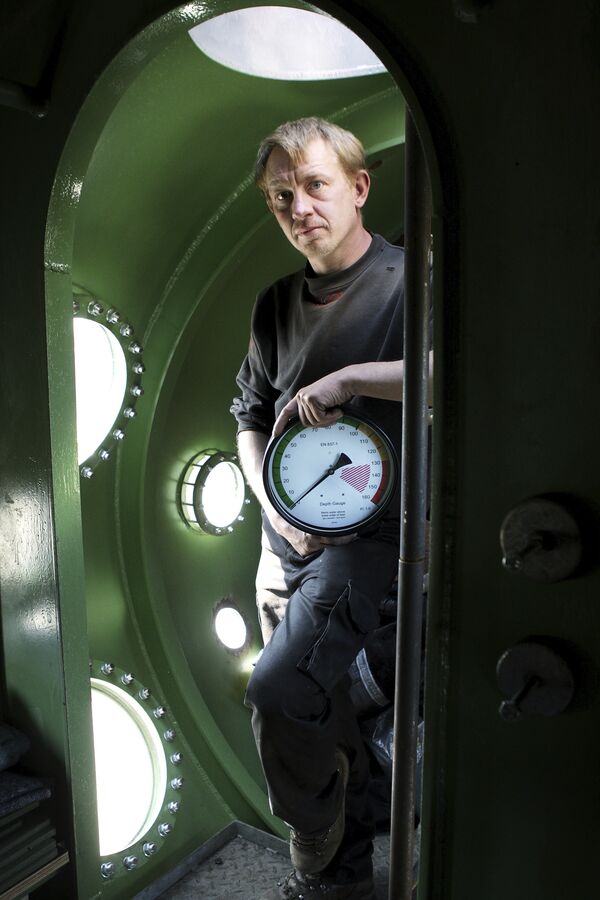 In this April 30, 2008 file photo, submarine owner Peter Madsen stands inside the vessel. - Sputnik International