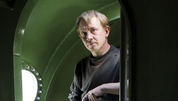 In this April 30, 2008 file photo, submarine owner Peter Madsen stands inside the vessel. - Sputnik International
