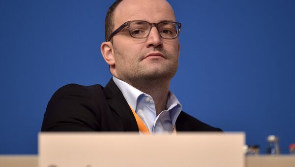 New Deputy Chairman Jens Spahn of the German Christian Democrats, CDU, watches from the podium during the 27th party convention in Cologne, Germany, Wednesday, Dec. 10, 2014. - Sputnik International