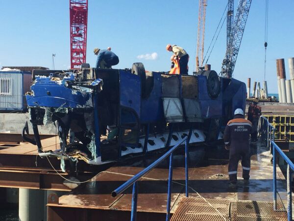 Rescuers raised the bus that plunged into the Kerch Strait from a bridge in Russia's Krasnodar region on Friday, August 25 Rescuers raised the bus that plunged into the Kerch Strait from a bridge in Russia's Krasnodar region on Friday, August 25 - Sputnik International
