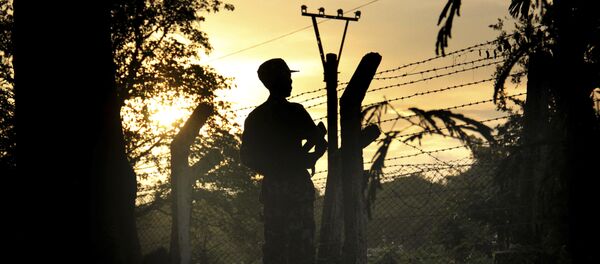 A Border Guard Police officer stands at a police post that was previously attacked by a Muslim terrorist group in Kyee Kan Pyin Buthidaung in which Myanmar government and military claim the existence of Muslim terrorists, in Rakhine state Myanmar, on Friday, July 14, 2017 A Border Guard Police officer stands at a police post that was previously attacked by a Muslim terrorist group in Kyee Kan Pyin Buthidaung in which Myanmar government and military claim the existence of Muslim terrorists, in Rakhine state Myanmar, on Friday, July 14, 2017 - Sputnik International
