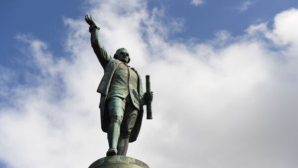 A statue of Captain James Cook stands in Sydney's Hyde Park on August 25, 2017, as Prime Minister Malcolm Turnbull labelled calls to change colonial-era monuments and the date of Australia Day, in attempts to better reflect the country's indigenous past, as a 'Stalinist' excercise in re-writing history. A cultural debate intensified this week when prominent indigenous commentator Stan Grant dubbed the inscription Discovered this territory 1770, on a Sydney statue of 18th century British explorer Capitan James Cook, a damaging myth. - Sputnik International