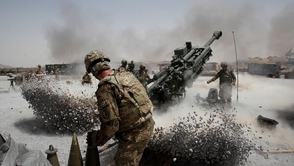 U.S. Army soldiers from the 2nd Platoon, B battery 2-8 field artillery, fire a howitzer artillery piece at Seprwan Ghar forward fire base in Panjwai district, Kandahar province southern Afghanistan (File) - Sputnik International