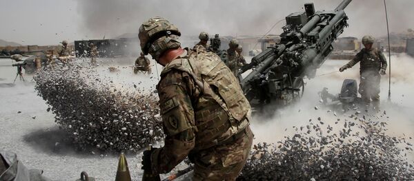 U.S. Army soldiers from the 2nd Platoon, B battery 2-8 field artillery, fire a howitzer artillery piece at Seprwan Ghar forward fire base in Panjwai district, Kandahar province southern Afghanistan (File) U.S. Army soldiers from the 2nd Platoon, B battery 2-8 field artillery, fire a howitzer artillery piece at Seprwan Ghar forward fire base in Panjwai district, Kandahar province southern Afghanistan (File) - Sputnik International