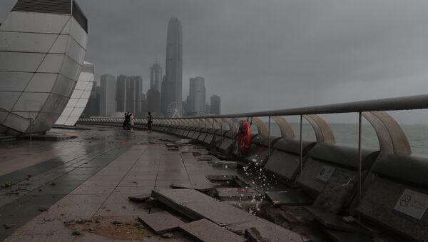 Debris caused by Typhoon Hato damage is strewn across the waterfront of Victoria Habour in Hong Kong, Wednesday, Aug. 23, 2017. - Sputnik International