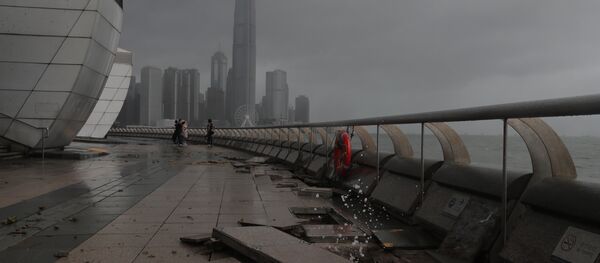 Debris caused by Typhoon Hato damage is strewn across the waterfront of Victoria Habour in Hong Kong, Wednesday, Aug. 23, 2017. - Sputnik International