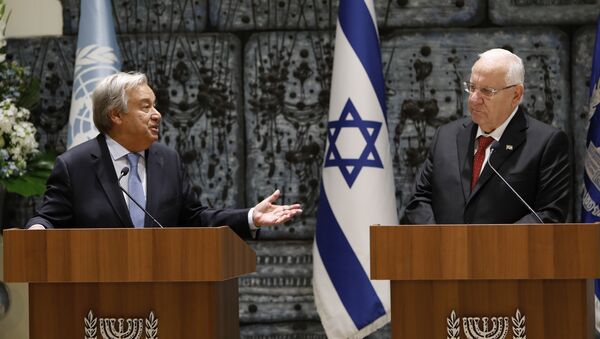 Israeli President Reuven Rivlin (R) and UN Secretary General Antonio Guterres deliver statements to the press prior to their meeting at the presidential compound in Jerusalem - Sputnik International