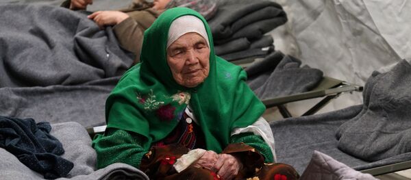 105-year old Afghan woman. Bibihal Uzbeki from Kunduz, Afghanistan, rests in Croatia's main refugee camp at Opatovac, Croatia, near the border with Serbia, Tuesday, Oct. 27, 2015 - Sputnik International