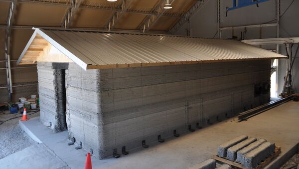 A barracks hut constructed with the Automated Construction of Expeditionary Structures is a new construction technology that prints concrete structures - Sputnik International