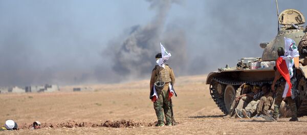 Shi'ite Popular Mobilization Forces (PMF) gather with Iraqi army on the outskirts of Tal Afar, Iraq, August 22, 2017 Shi'ite Popular Mobilization Forces (PMF) gather with Iraqi army on the outskirts of Tal Afar, Iraq, August 22, 2017 - Sputnik International