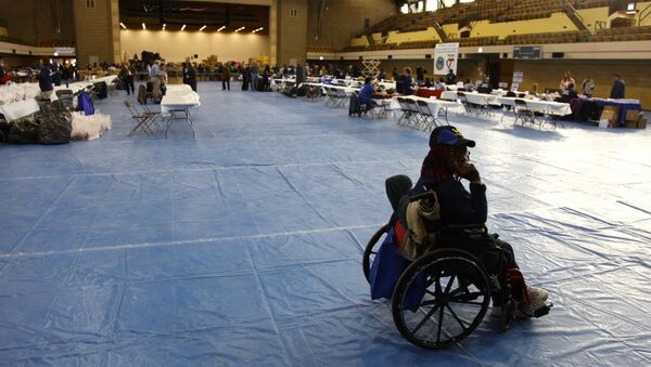 A female veteran sits in a wheelchair as veterans from all eras gathered Thursday, Nov. 10, 2011, at the Humboldt Park Armory in Chicago for an event sponsored by the Veteran's Administratration on the eve of Veteran's Day - Sputnik International