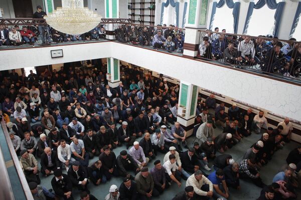 Muslims celebrating Eid al-Adha at a mosque in Ust-Dzheguta in the Russian Caucasus. Muslims celebrating Eid al-Adha at a mosque in Ust-Dzheguta in the Russian Caucasus. - Sputnik International