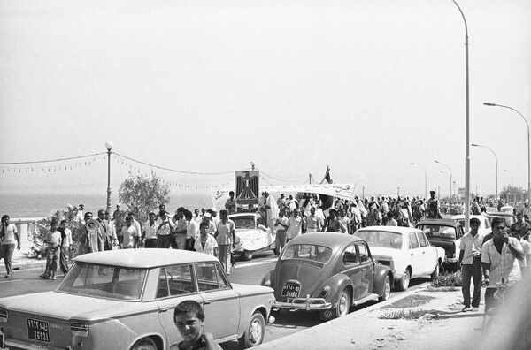 A crowd of about 1,000 Libyans gather in streets of Tripoli on August 5, 1970, shouting greetings and slogans of support for Col. Moammar Gadhafi, head of the Libyan Revolutionary Command Council and Premier of Libya. A crowd of about 1,000 Libyans gather in streets of Tripoli on August 5, 1970, shouting greetings and slogans of support for Col. Moammar Gadhafi, head of the Libyan Revolutionary Command Council and Premier of Libya. - Sputnik International