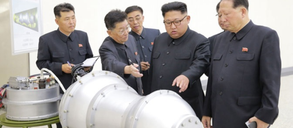 DPRK state-run media outlet KCNA September 3, 2017, handout purporting to show Pyongyang leader Kim Jong-un viewing newly developed miniaturized hydrogen bomb capable of being mounted on ICBM. // KCNA handout - Sputnik International