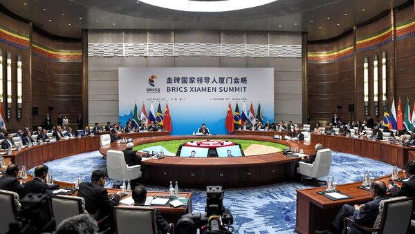 General view of Brazil's President Michel Temer, Russian President Vladimir Putin, Chinese President Xi Jinping, South Africa's President Jacob Zuma and Indian Prime Minister Narendra Modi during the plenary session during the BRICS Business Forum at the BRICS Summit in Xiamen, Fujian province on September 4, 2017 - Sputnik International