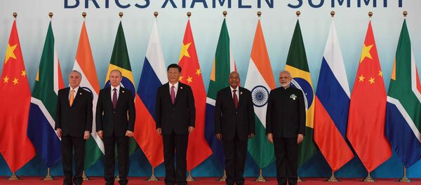 September 4, 2017. Russian President Vladimir Putin poses for a group photograph of the BRICS leaders. From right: Indian Prime Minister Narendra Modi, South African President Jacob Zuma and Chinese President Xi Jinping. Left: Brazilian President Michel Temer September 4, 2017. Russian President Vladimir Putin poses for a group photograph of the BRICS leaders. From right: Indian Prime Minister Narendra Modi, South African President Jacob Zuma and Chinese President Xi Jinping. Left: Brazilian President Michel Temer - Sputnik International