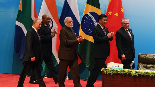 From left: Russian President Vladimir Putin, South African republic President jacob Zuma, Indian Prime Minister Narendra Modi, Chinese President Xi Jinping and Brazilian President Michel Temer seen at the BRICS leaders' meeting with BRICS Business Council members, September 4, 2017 - Sputnik International