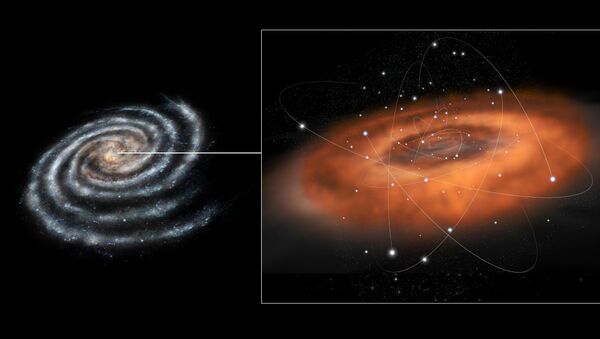 This artist concept illustrates the frenzied activity at the core of our Milky Way galaxy. The galactic center hosts a supermassive black hole in the region known as Sagittarius A*, or Sgr A*, with a mass of about four million times that of our sun. - Sputnik International