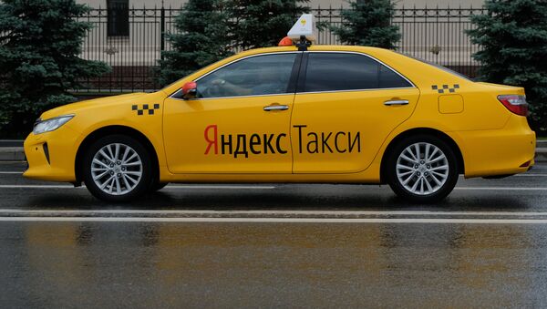 A car of the Yandex Taxi service in a street of Moscow - Sputnik International