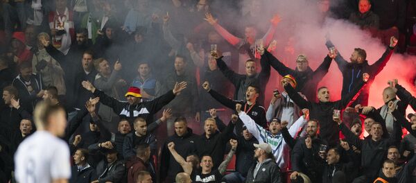 German supporters light flares during the FIFA World Cup 2018 qualification football match between Czech Republic and Germany in Prague, Czech Republic, on September 1, 2017 German supporters light flares during the FIFA World Cup 2018 qualification football match between Czech Republic and Germany in Prague, Czech Republic, on September 1, 2017 - Sputnik International