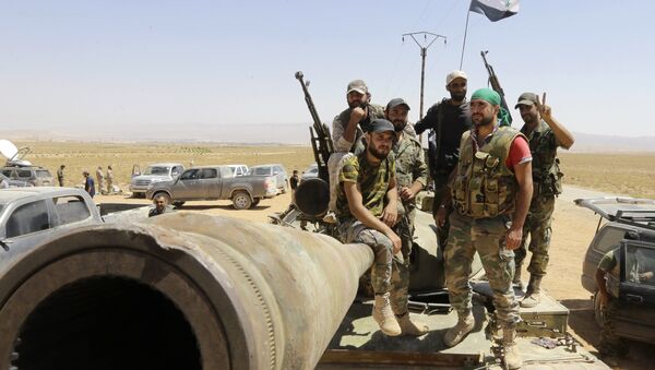 Syrian army fighters stand guard in the Qara area, in Syria's Qalamoun region (File) - Sputnik International