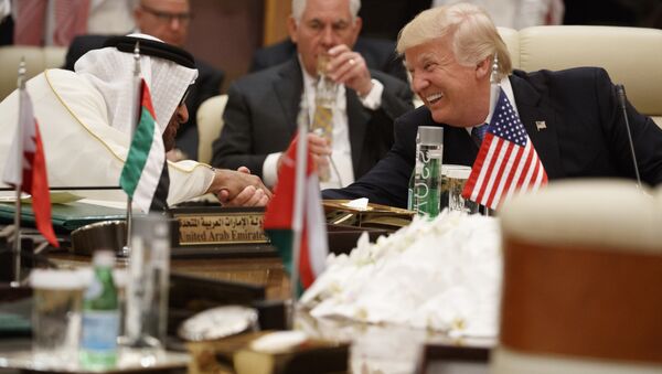 US President Donald Trump shakes hands with Abu Dhabi's Crown Prince Mohammed bin Zayed Al Nahyan during a meeting with leaders at the Gulf Cooperation Council Summit, at the King Abdulaziz Conference Center, Sunday, May 21, 2017, in Riyadh, Saudi Arabia. - Sputnik International