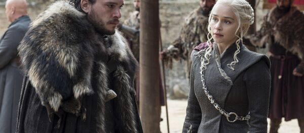 This image released by HBO shows Kit Harington, left, and Emilia Clarke on the season finale of Game of Thrones. The series set yet another audience record Sunday with its seventh-season finale. This image released by HBO shows Kit Harington, left, and Emilia Clarke on the season finale of Game of Thrones. The series set yet another audience record Sunday with its seventh-season finale. - Sputnik International