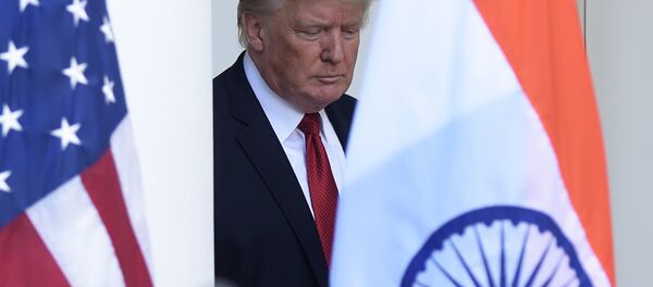 President Donald Trump walks out from the Oval Office to make a joint statement with Indian Prime Minister Narendra Modi in the Rose Garden of the White House in Washington - Sputnik International