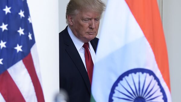 President Donald Trump walks out from the Oval Office to make a joint statement with Indian Prime Minister Narendra Modi in the Rose Garden of the White House in Washington - Sputnik International