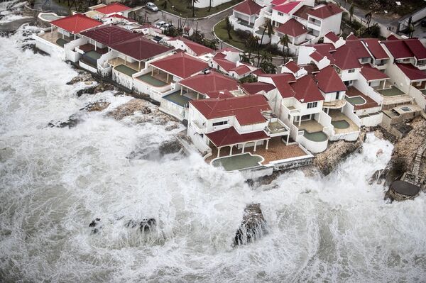 This Sept. 6, 2017 photo provided by the Dutch Defense Ministry shows a few of the homes that remained intact in the aftermath of Hurricane Irma, in St. Maarten. Irma cut a path of devastation across the northern Caribbean, leaving thousands homeless after destroying buildings and uprooting trees.  - Sputnik International