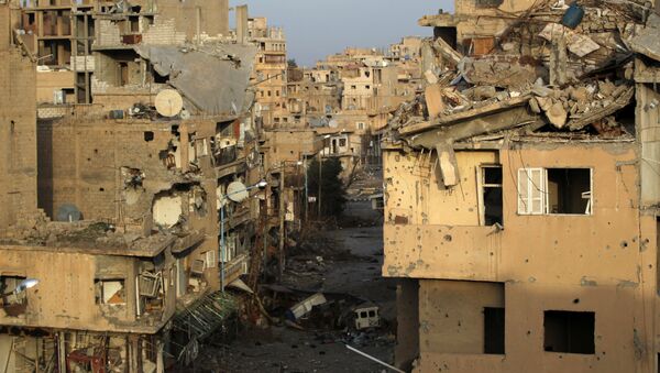 A view shows damaged buildings in Deir al-Zor, eastern Syria February 19, 2014 - Sputnik International