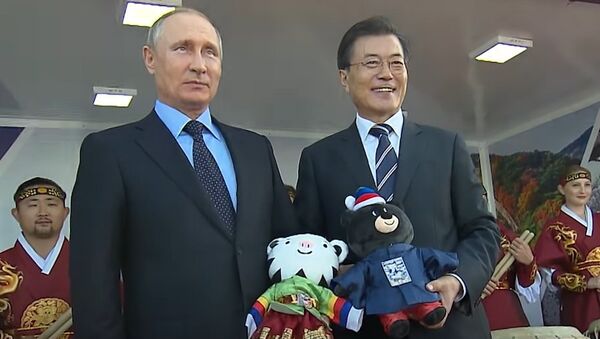 President Putin Receives 2018 Olympic Symbols As Gift - Sputnik International