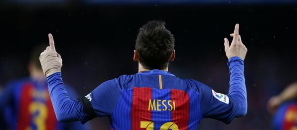 FC Barcelona's Lionel Messi celebrates after scoring during the Spanish La Liga soccer match between FC Barcelona and Sevilla at the Camp Nou stadium in Barcelona, Spain, Wednesday, April 5, 2017 - Sputnik International