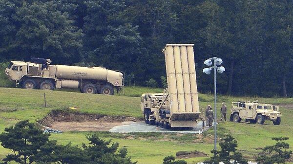 U.S. missile defense system called Terminal High Altitude Area Defense, or THAAD, is seen at a golf course in Seongju, South Korea, Wednesday, Sept. 6, 2017 - Sputnik International
