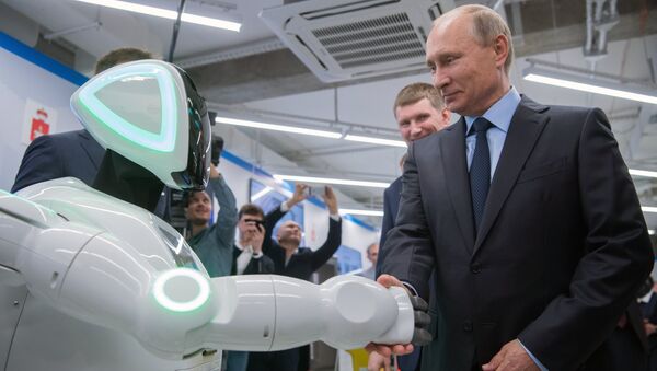Russian President Vladimir Putin views a showroom of small and medium-size businesses engaged in 'digital economy' as he visits the ER-Telecom Holding in Perm - Sputnik International