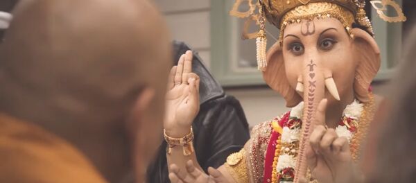 Lord Ganesha portrayed eating meat Lord Ganesha portrayed eating meat - Sputnik International