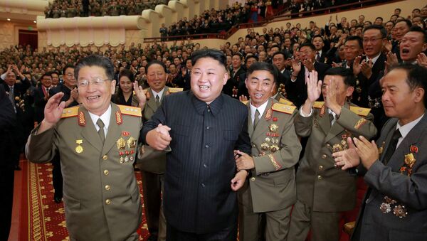 North Korean leader Kim Jong Un reacts during a celebration for nuclear scientists and engineers who contributed to a hydrogen bomb test, in this undated photo released by North Korea's Korean Central News Agency (KCNA) in Pyongyang on September 10, 2017 - Sputnik International