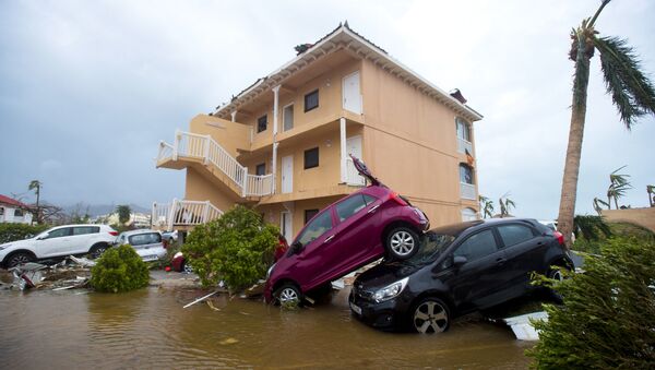 A photo taken on September 6, 2017 shows cars piled on top of one another in Marigot, near the Bay of Nettle, on the French Collectivity of Saint Martin, after the passage of Hurricane Irma - Sputnik International