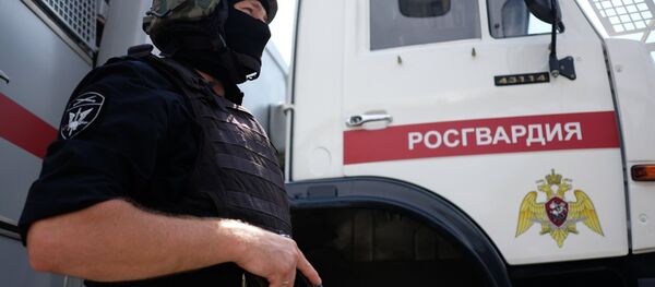 A staff member of the Special Purpose Police Unit of the Russian National Guard Main Administration A staff member of the Special Purpose Police Unit of the Russian National Guard Main Administration - Sputnik International