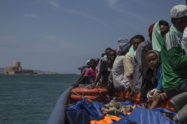 Dignity I, an MSF rescue boat brought 103 people ashore at Trapani, Sicily, on July 9, 2015. Dignity I, an MSF rescue boat brought 103 people ashore at Trapani, Sicily, on July 9, 2015. - Sputnik International