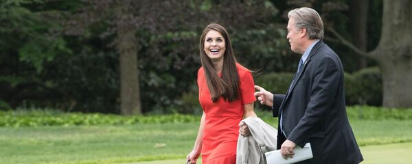 White House Director of Strategic Communications Hope Hicks (L) and Chief Strategist Steve Bannon (R) walk to board Marine One as US President Donald Trump departs the White House for Harrisburg, Pensylvannia, where he will hold a rally on the 100th day of his presidency on April 29, 2017 in Washington, DC White House Director of Strategic Communications Hope Hicks (L) and Chief Strategist Steve Bannon (R) walk to board Marine One as US President Donald Trump departs the White House for Harrisburg, Pensylvannia, where he will hold a rally on the 100th day of his presidency on April 29, 2017 in Washington, DC - Sputnik International