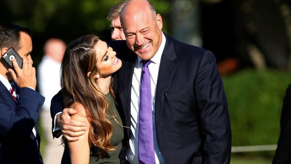 Trump's communication director Hope Hicks and Trump's economic adviser Gary Cohn speak before observing a moment of silence in remembrance of those lost in the 9/11 attacks at the White House in Washington, U.S. September 11, 2017 - Sputnik International