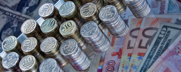 Banknotes (rubles, euros, US dollars) and Russian 5 and 10 kopecks coins. (File) - Sputnik International